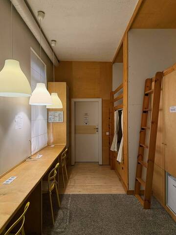 Кровать в 9-местном общем номере в Гостинице KoikaGo